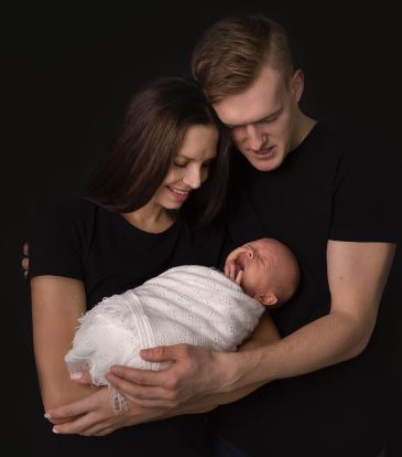 Martyna Swiderska with her husband Karol Swiderski and newly born son